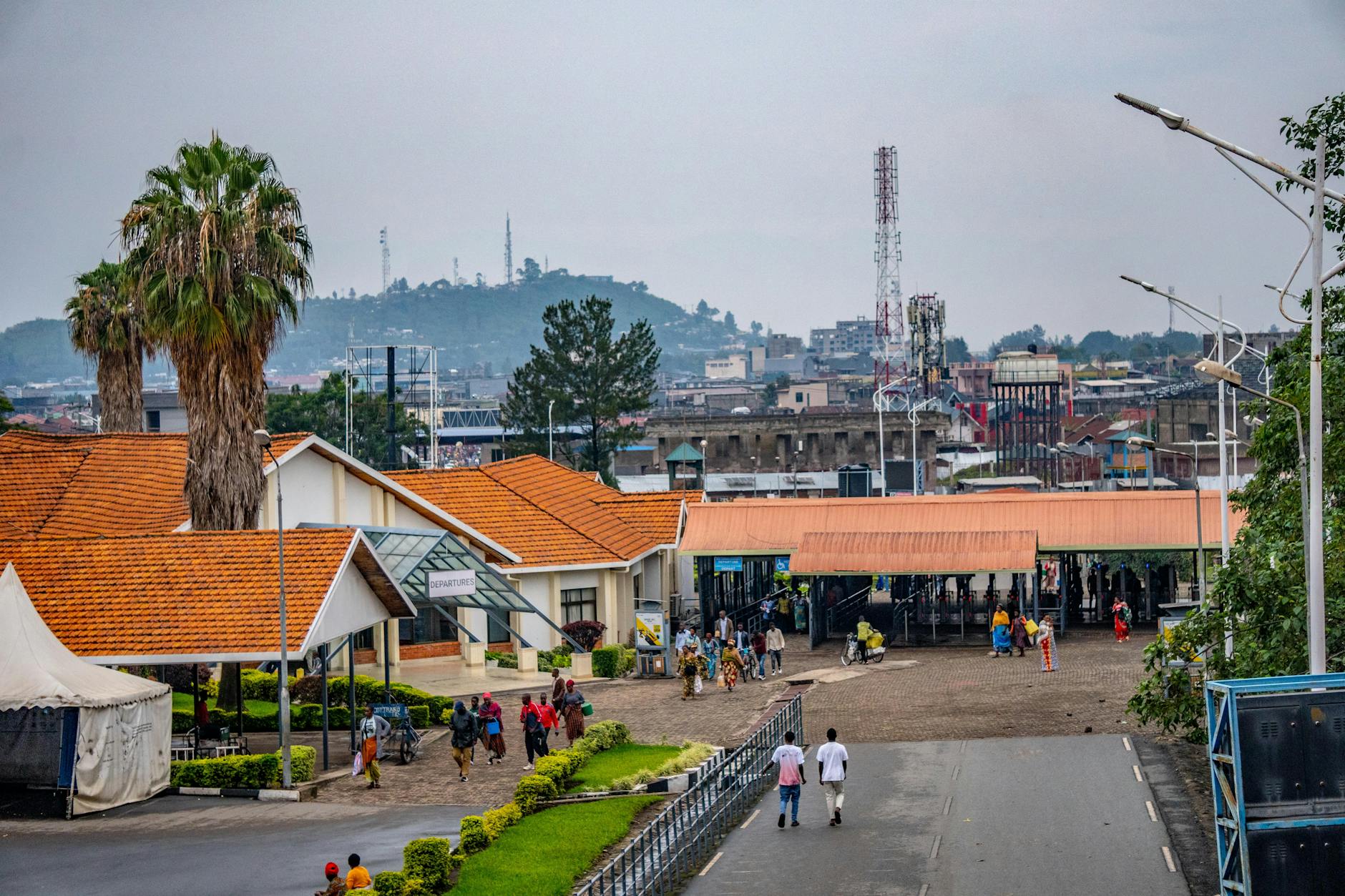 bustling african city scene with orange rooftops